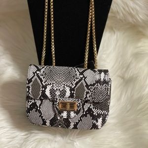 Small Beautiful. Black and light brown black  shoulder bag